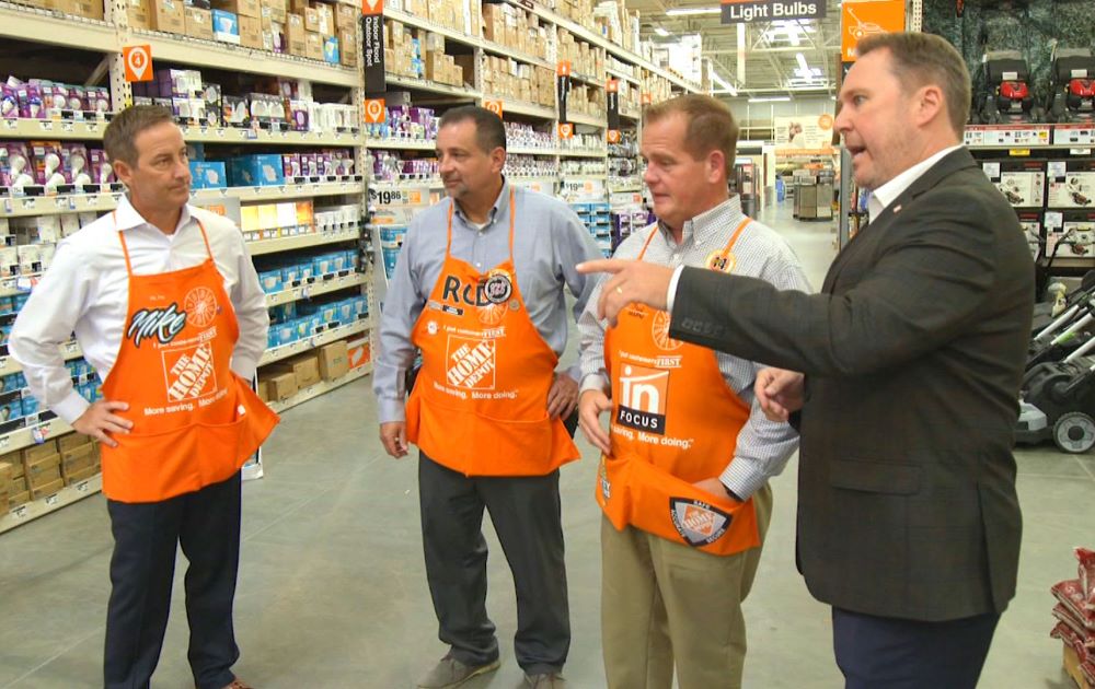 Home Depot staff talk to each other
