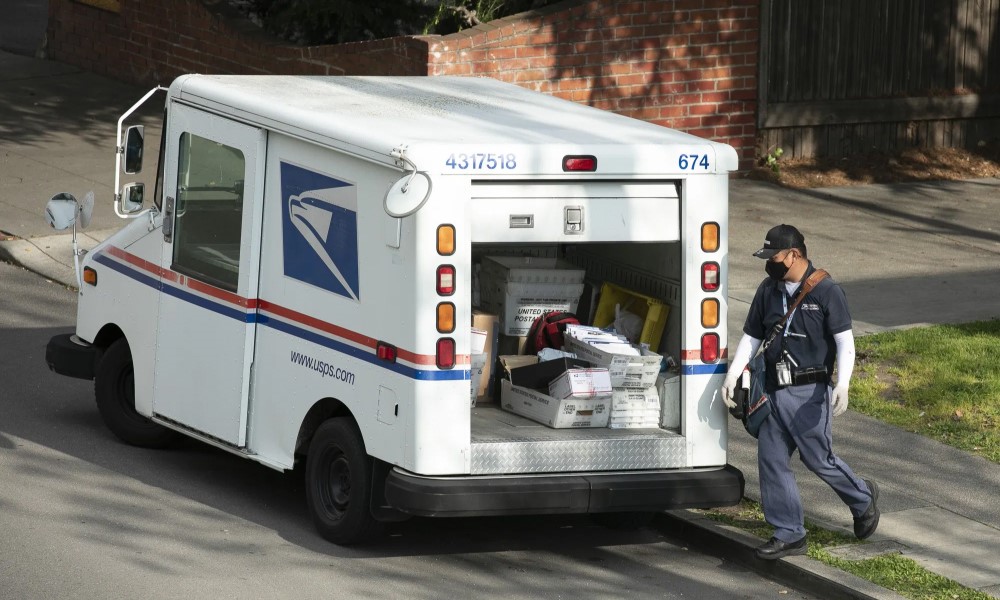 USPS delivery man with the truck