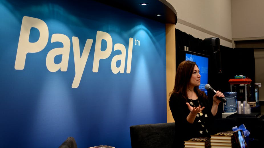 a young lady gives talk at Paypal event
