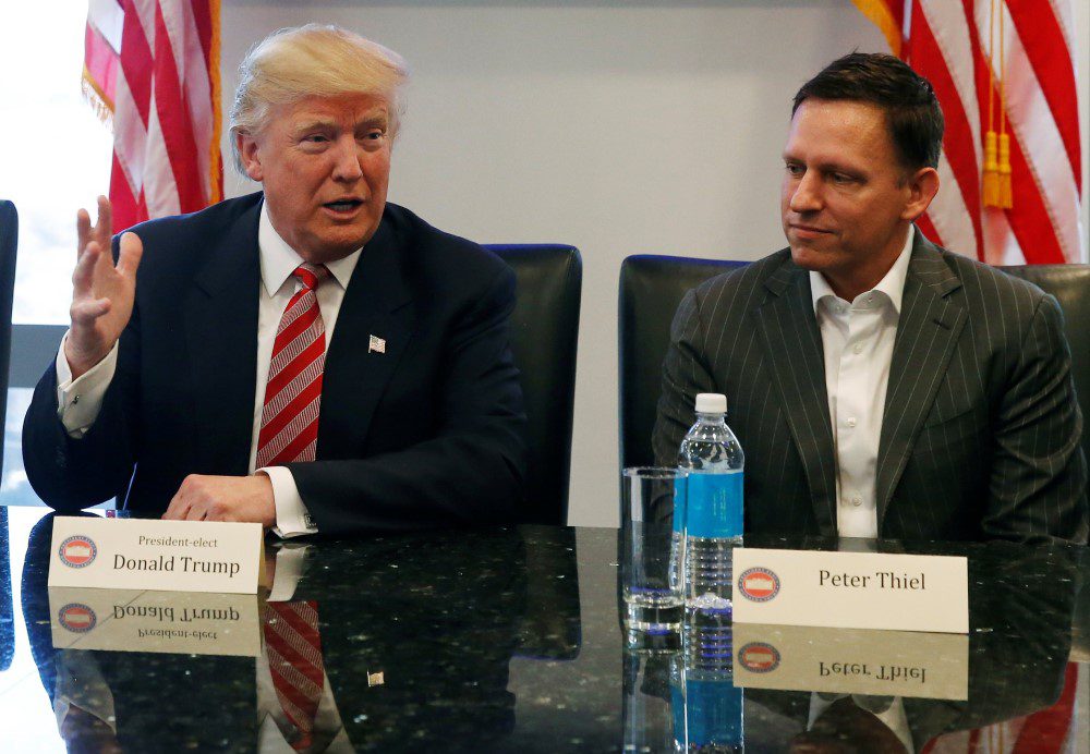 Palantir founder Peter Thiel at a meeting with Donald Trump