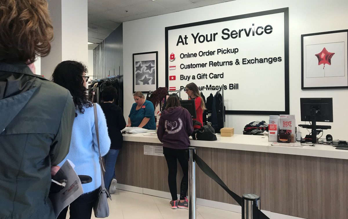 Macys customers wait in line to pickup online oreders