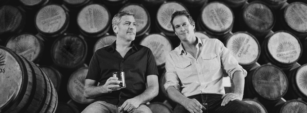 Casamigos co-founders at a liquor manufacture plant