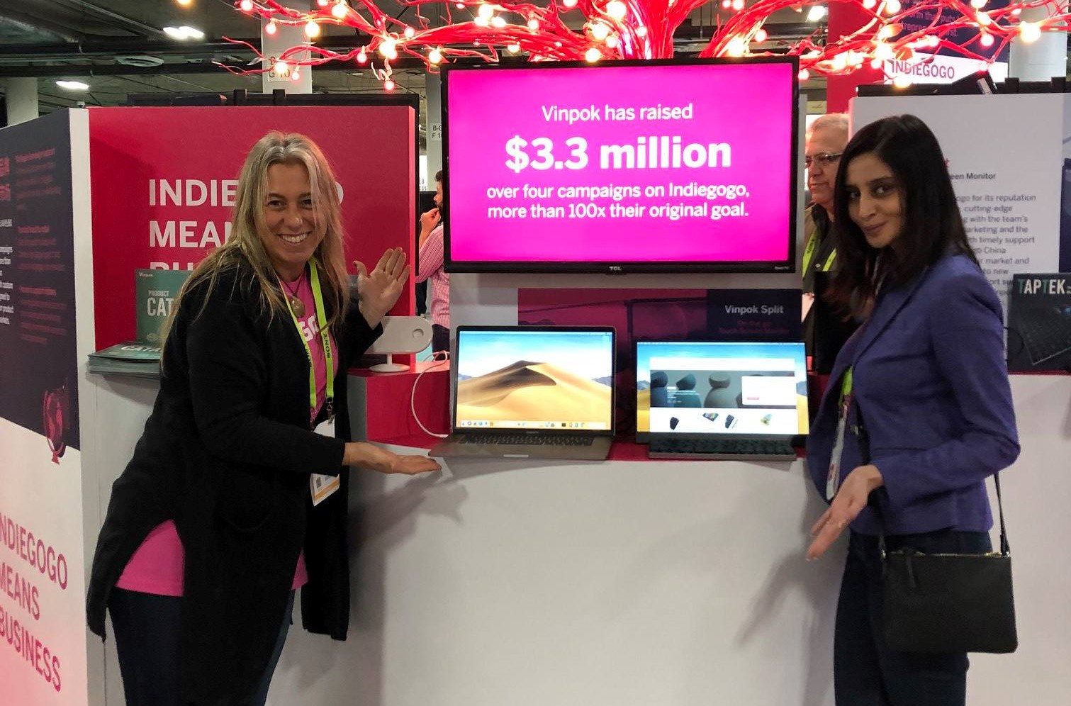 Indiegogo staff at their booth in a tradeshow