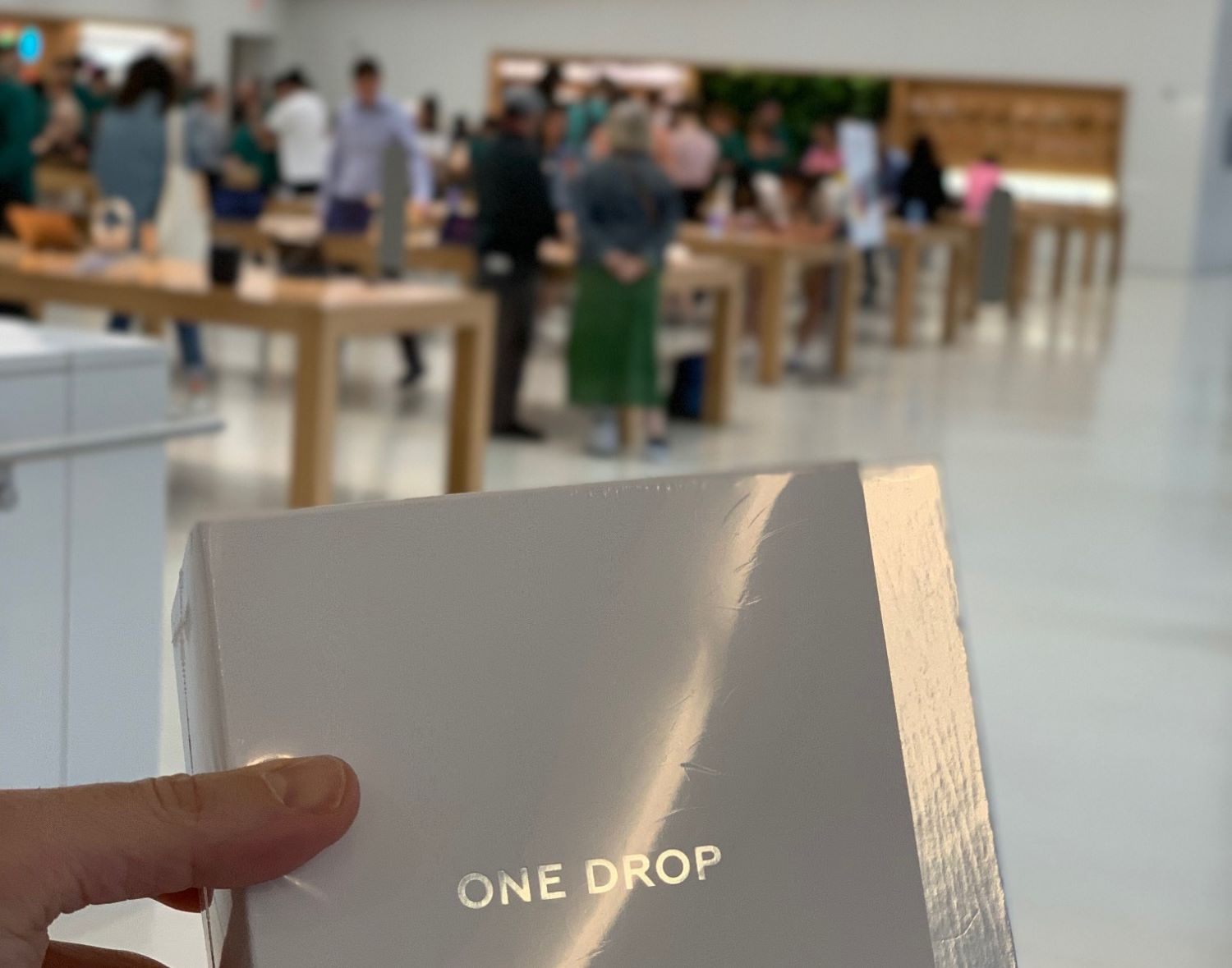 Customers with One Drop product at Apple store